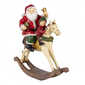 Santa s dítětem na houpacím koníkovi