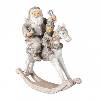 Santa s chlapcem na houpacím koníkovi