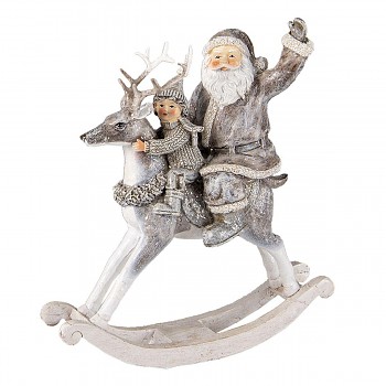 Santa s chlapcem na houpacím jelenovi